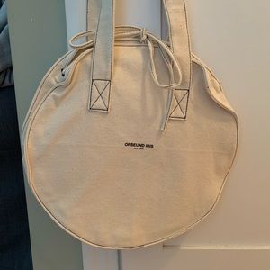 Brand new Orseund Iris circle canvas bag